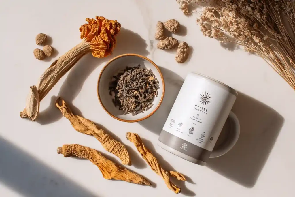 Ryze mushroom coffee with natural weight loss ingredients like Cordyceps and Reishi on a marble surface